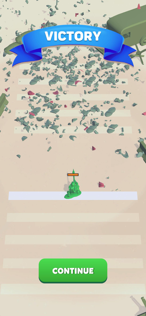 Toy Soldiers 3D - A victory screen in the Toy Soldiers 3D mobile game showing scattered broken toy parts and a single green plastic soldier