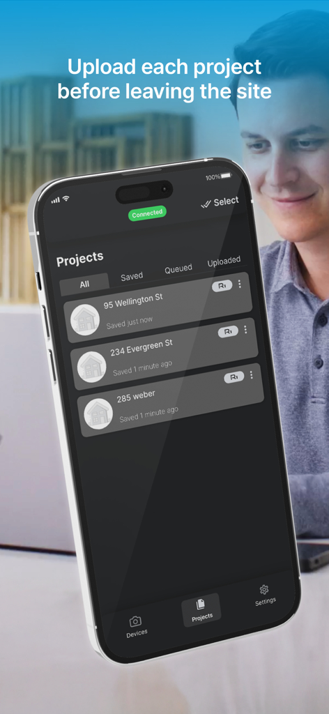 IPhone screen displaying the iGUIDE PLANIX app project list with real estate addresses and upload status