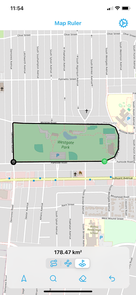 Map Ruler - Distance Measure - Interfaz de la aplicación Map Ruler mostrando el cálculo del área de un parque en un mapa
