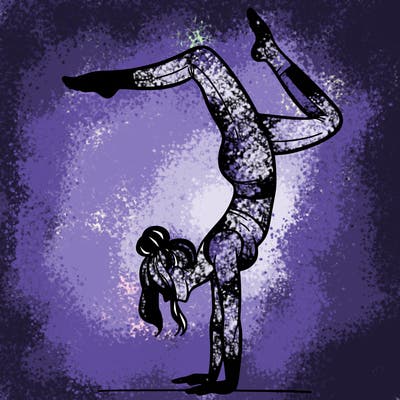 a woman doing a handstand