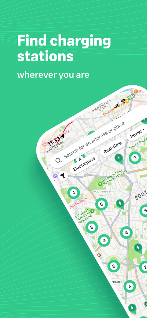 Electromaps: Charging stations - Smartphone display of the Electromaps app showing a city map with multiple green icons representing available electric vehicle charging stations.