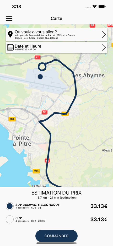 En woute - Interface de l'application En woute montrant une carte de trajet de taxi et une estimation du prix pour un trajet en Guadeloupe.