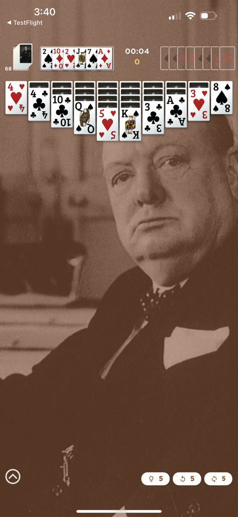 Churchill Solitaire mobile game interface featuring a portrait of Winston Churchill and a complex card layout