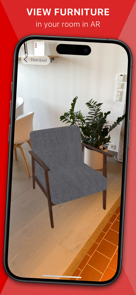 La aplicación Roomle muestra un sillón 3D colocado en una sala de estar usando realidad aumentada