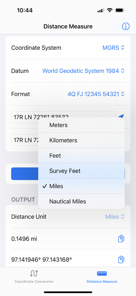 Interface of the Map Tools app showing distance measurement settings with MGRS coordinates and a distance unit selection menu