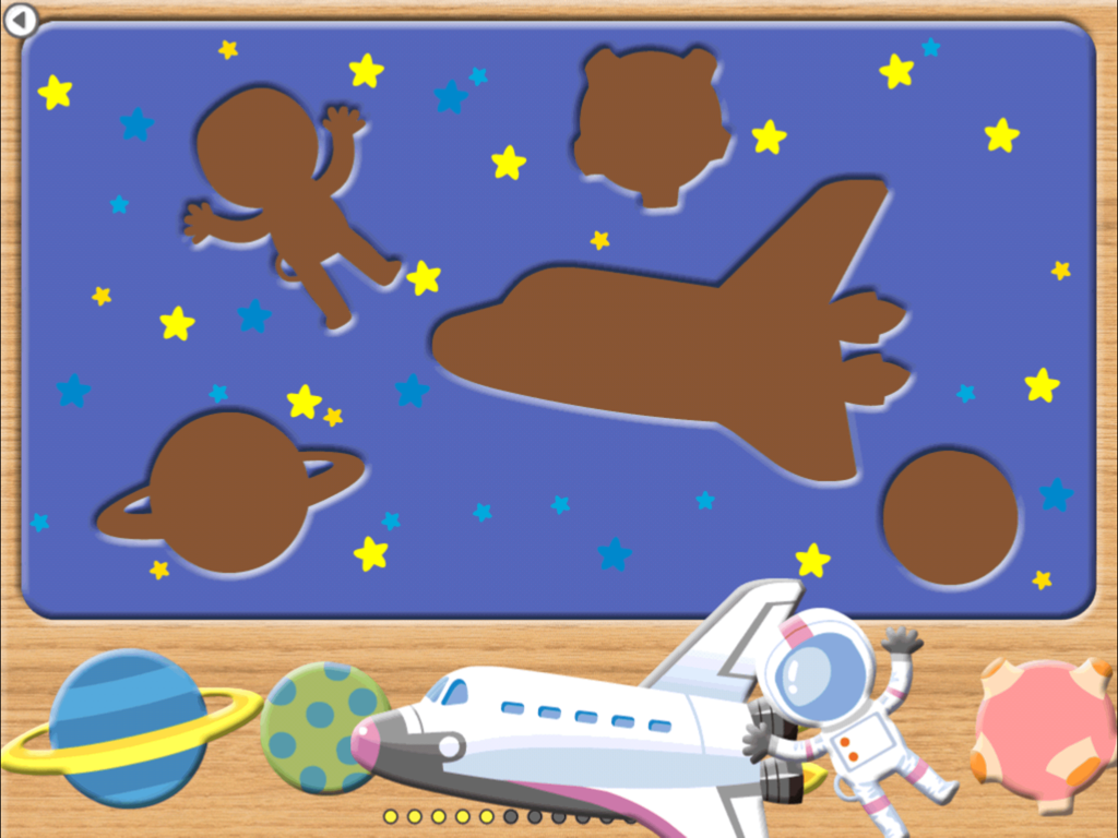 A space themed digital puzzle game for children showing silhouettes of an astronaut and a spaceship against a starry background