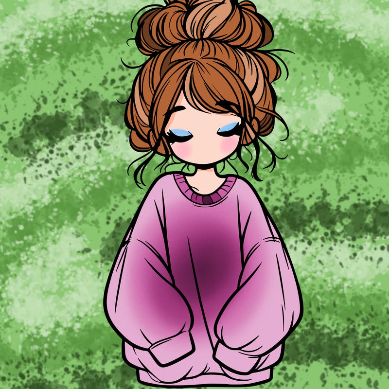 girl with baggy sweatshirt and messy bun