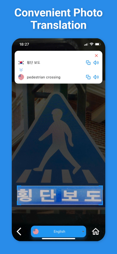 Screenshot der Korean Translator App, der eine Fotoübersetzung eines Fußgängerüberwegschilds von Koreanisch nach Englisch zeigt
