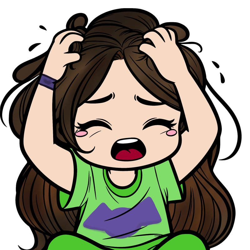 a girl grabbing her hair crying