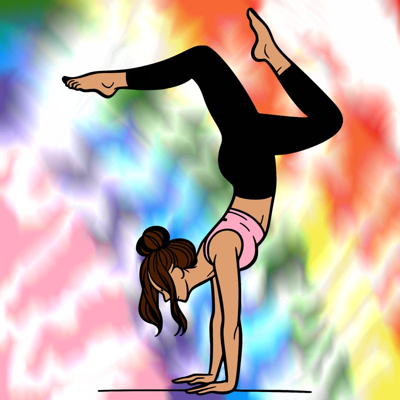 a woman doing a handstand