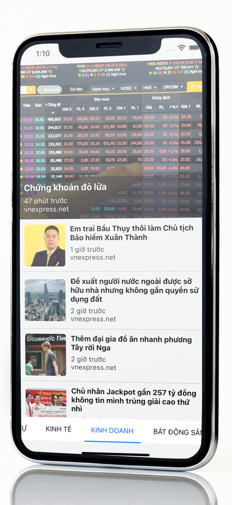 Báo Nhanh - Đọc báo siêu nhanh - Mobile app interface of Bao Nhanh showing business and finance news articles in Vietnamese.