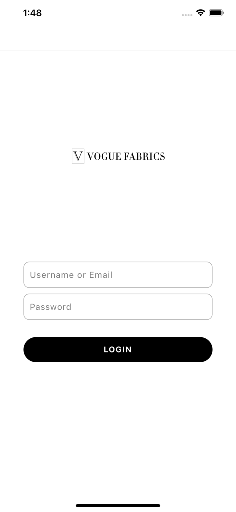 Login screen for the Vogue Fabrics wholesale app with username and password fields.