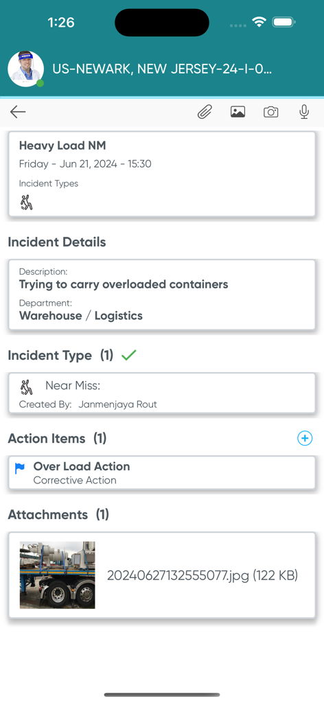 Ideagen EHS - A safety near miss report in the Ideagen EHS app showing details of an overloaded container in a warehouse with an attached photo