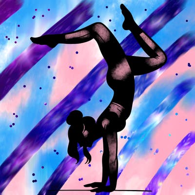 a woman doing a handstand