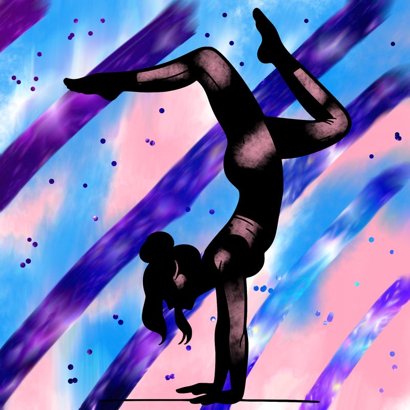 a woman doing a handstand