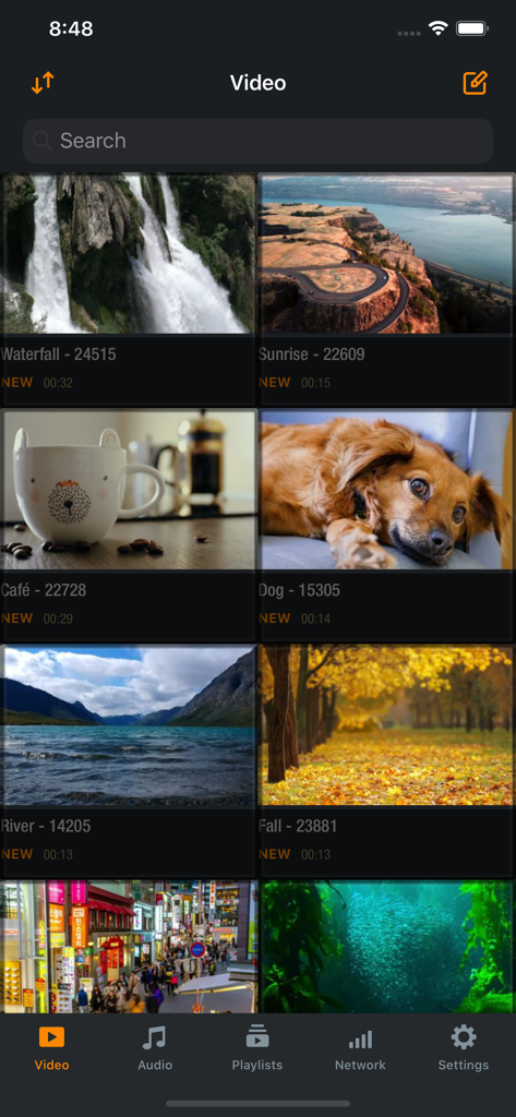 Azul - Video Player for iPhone - A grid view of the Azul Video Player library showing various video thumbnails and the bottom navigation menu