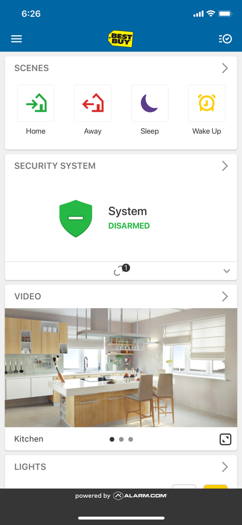 Best Buy Assured Living app dashboard showing smart home scenes security system status and a kitchen video feed