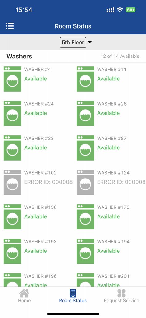 A mobile interface for the Coinamatic app showing real-time availability of washing machines on a specific floor of a building.