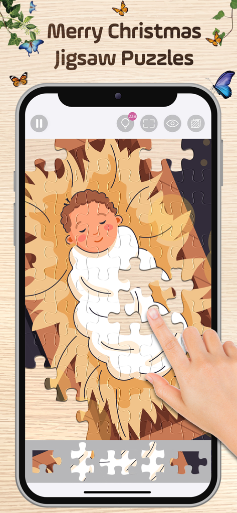 Una mano colocando una pieza en un rompecabezas de la Natividad del Niño Jesús en la aplicación Bible Puzzles