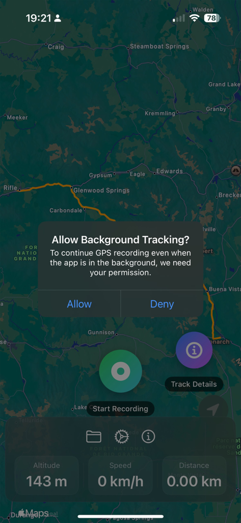 GPS Trace - Track & Record - GPS Trace app asking for background tracking permission over a navigation map.