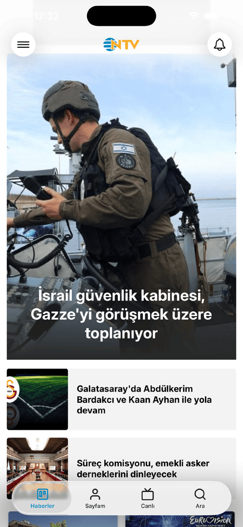 Interfaz de la aplicación móvil NTV mostrando un artículo de noticias principal sobre el gabinete de seguridad israelí y una barra de navegación con noticias, perfil, en vivo y búsqueda.