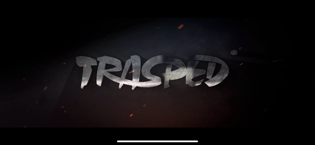 RC Car App - TRASPED metallic logo on a dark background with orange sparks
