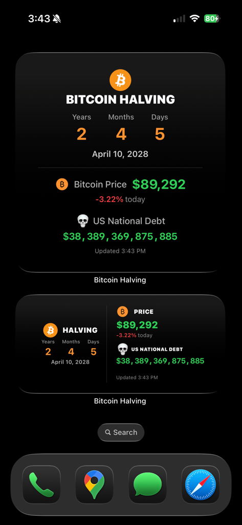 Tela inicial do iPhone mostrando widgets de contagem regressiva do halving do Bitcoin e rastreador da dívida nacional dos EUA em modo escuro