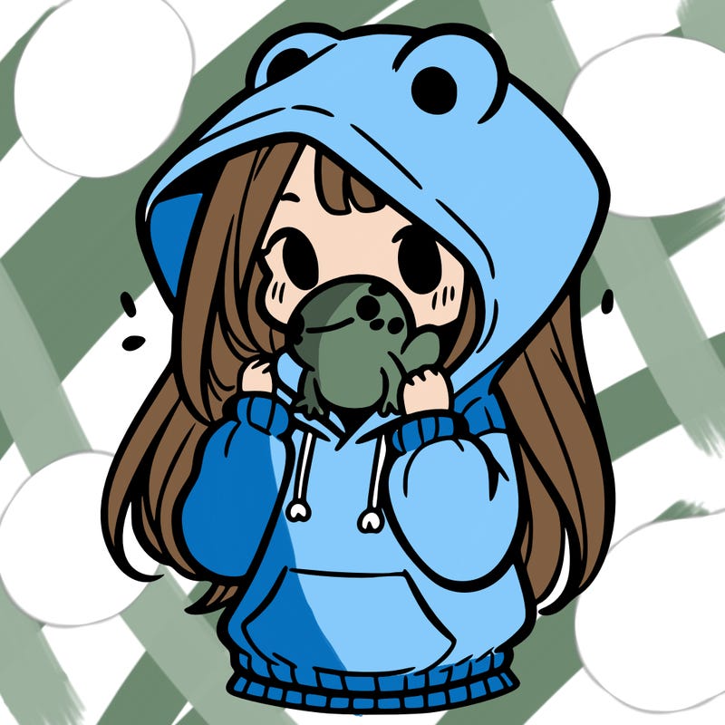 a girl holding a froggy hoodie