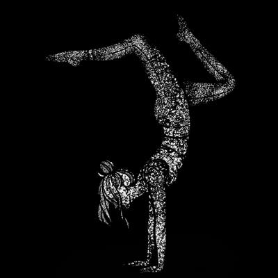 a woman doing a handstand