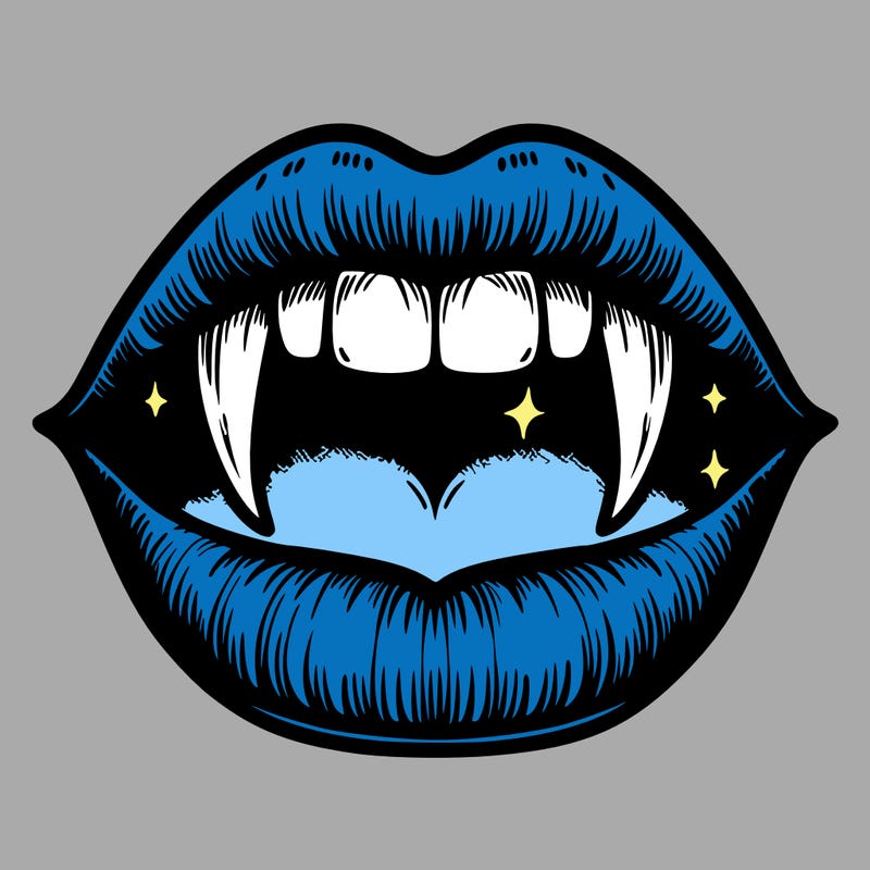 lips with vampire teeth