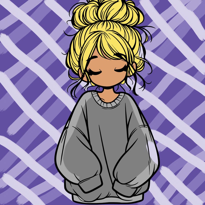 girl with baggy sweatshirt and messy bun