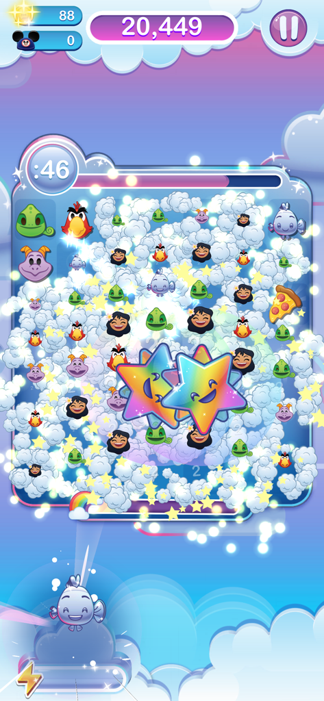 Gameplay of Disney Emoji Blitz showing a match 3 board with Disney characters and rainbow star power ups