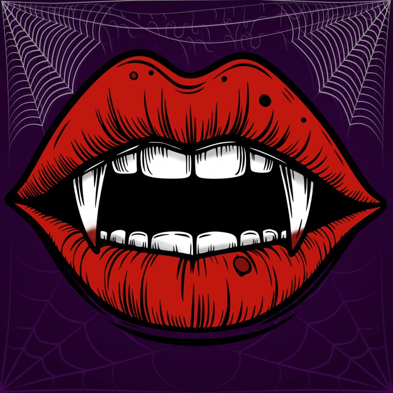lips with vampire teeth