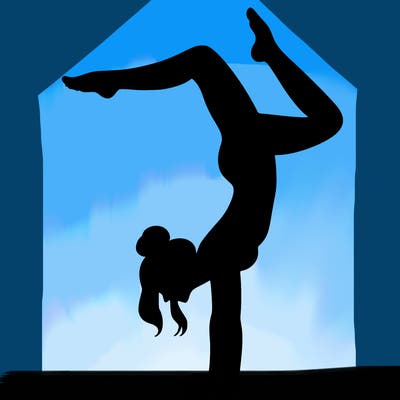 a woman doing a handstand