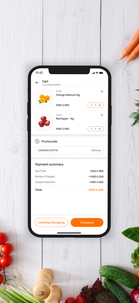 Karrot App - Smartphone screen showing the Karrot app cart with oranges and apples including a payment summary and checkout button