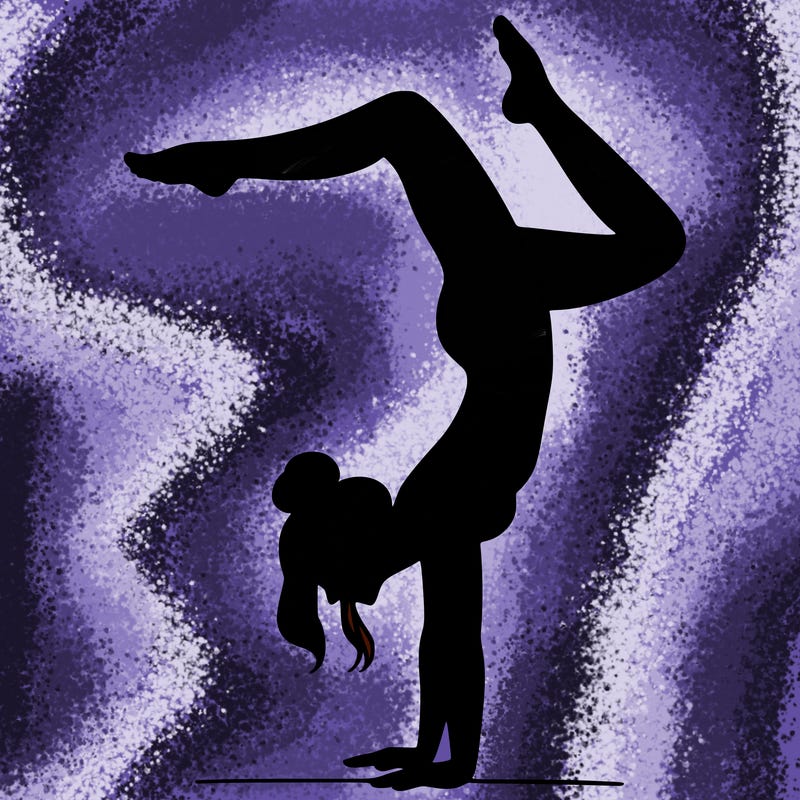 a woman doing a handstand