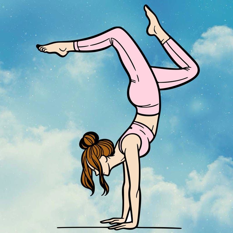 a woman doing a handstand