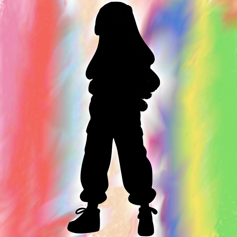 girl in baggy pants crop top and long hair