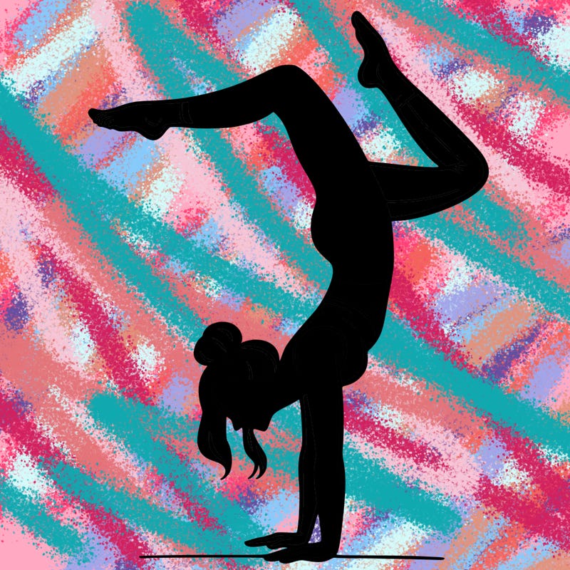 a woman doing a handstand