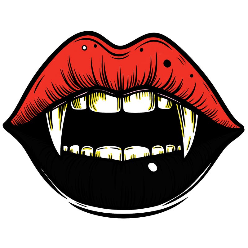 lips with vampire teeth