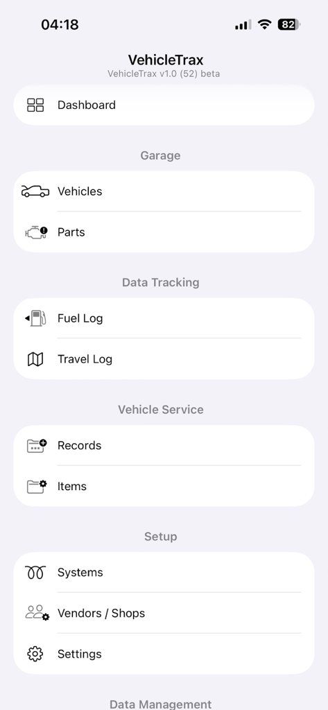 VehicleTrax - Main dashboard and navigation menu of the VehicleTrax app showing Garage, Data Tracking, and Vehicle Service sections.