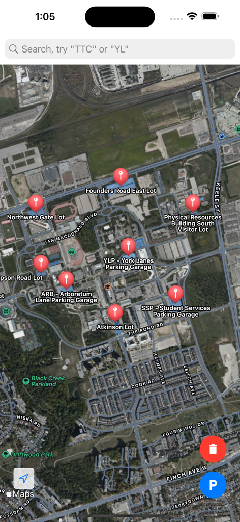 Satellite map view of York University campus showing various parking lots with red pins in the York U Maps app