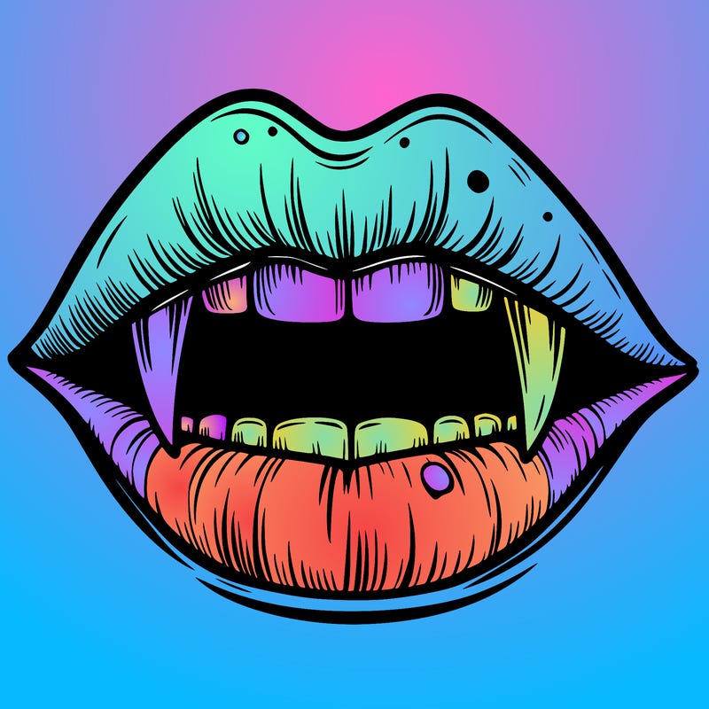 lips with vampire teeth