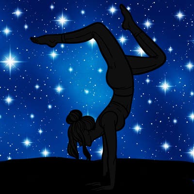 a woman doing a handstand