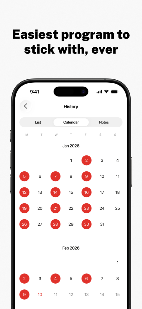 Pantalla del historial de entrenamiento de Stronglifts 5x5 que muestra un calendario con círculos rojos en los días de entrenamiento completados