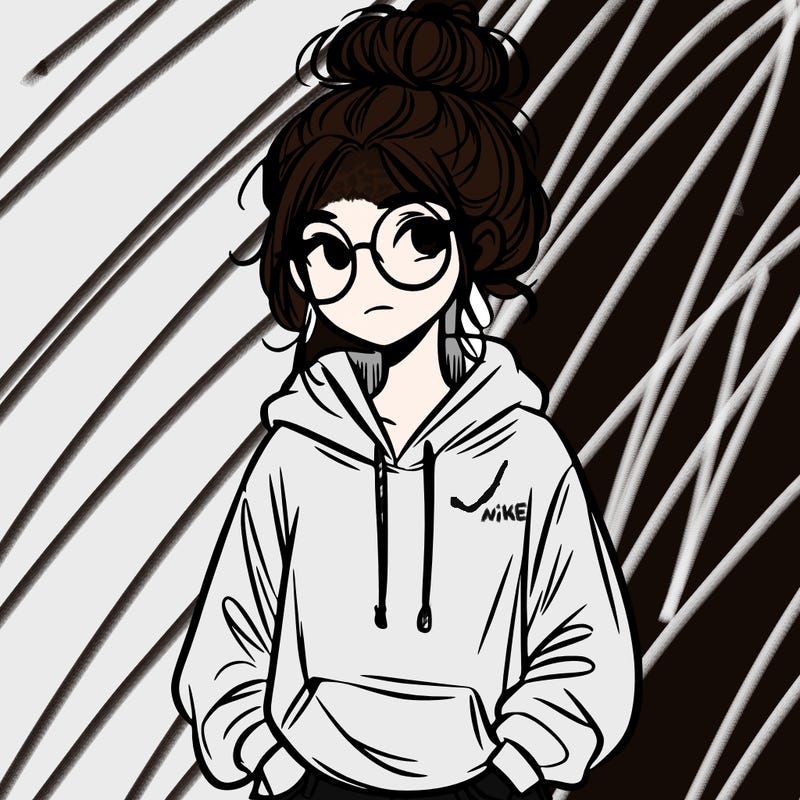 teen girl with a messy bun and glasses wearing a loose hoodie and jeans