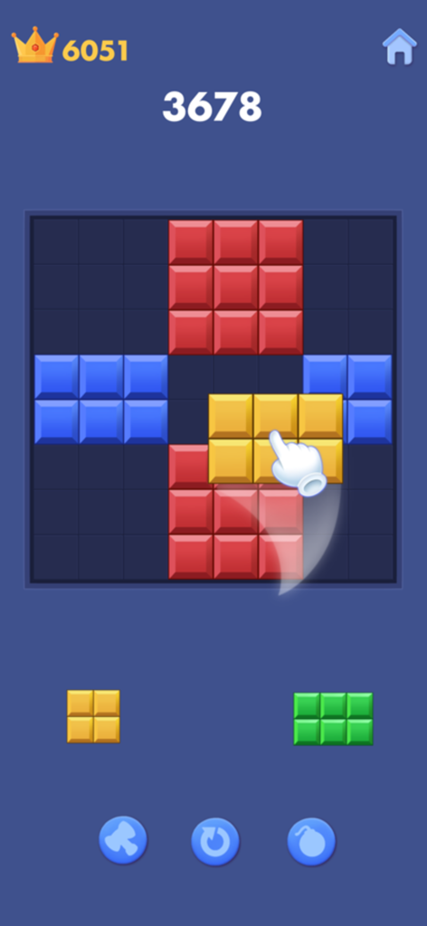 Block Blast - Block Puzzle - Block Blastブロックパズルのゲームプレイ画面、手がカラフルなブロックをグリッドにドラッグしている様子。