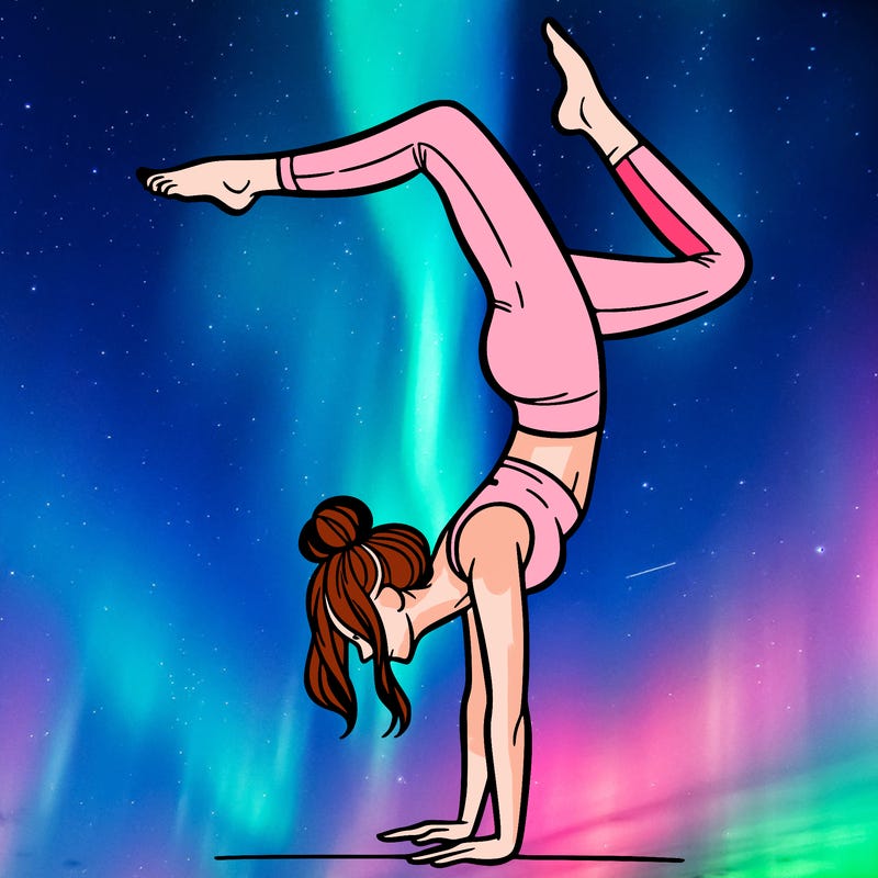 a woman doing a handstand