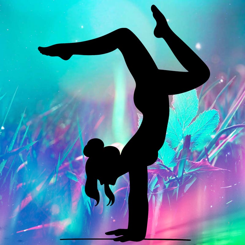 a woman doing a handstand