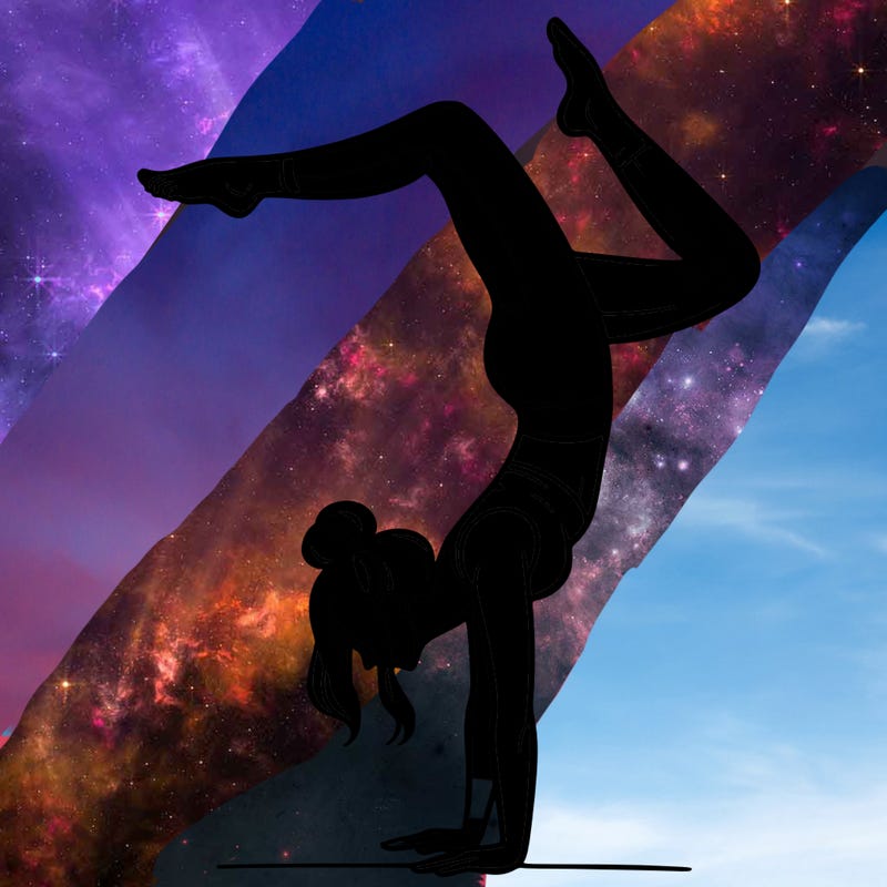 a woman doing a handstand